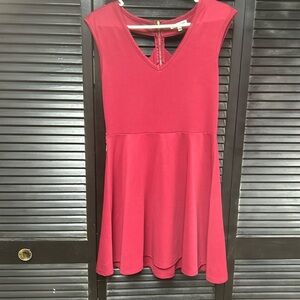 Short women’s dress with cross back design